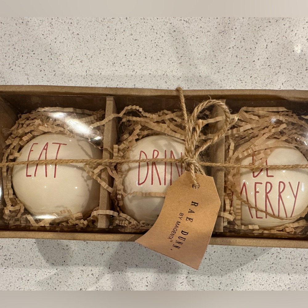 Rae Dunn, eat drink be merry Christmas ornaments.